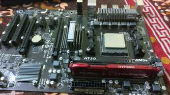 Gigabyte AM3+ motherboard with AMD CPU and HyperX RAM