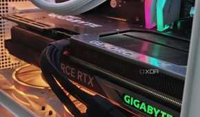 An image showing the Gigabyte GeForce RTX 4070 Ti Gaming OC GPU installed in a PC with RGB lights.