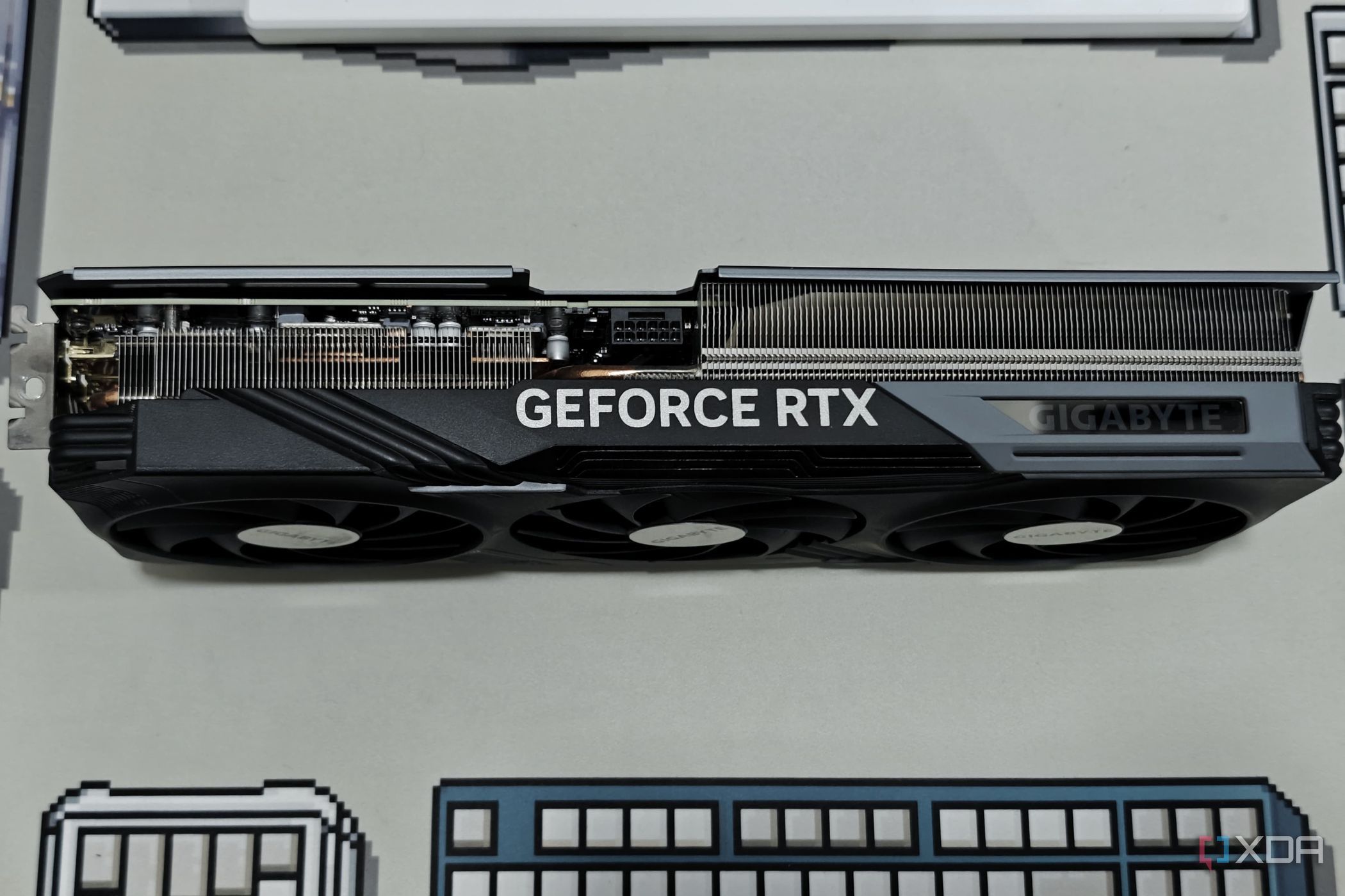 An image showing the side profile of the Gigabyte GeForce RTX 4070 Ti Gaming OC GPU.