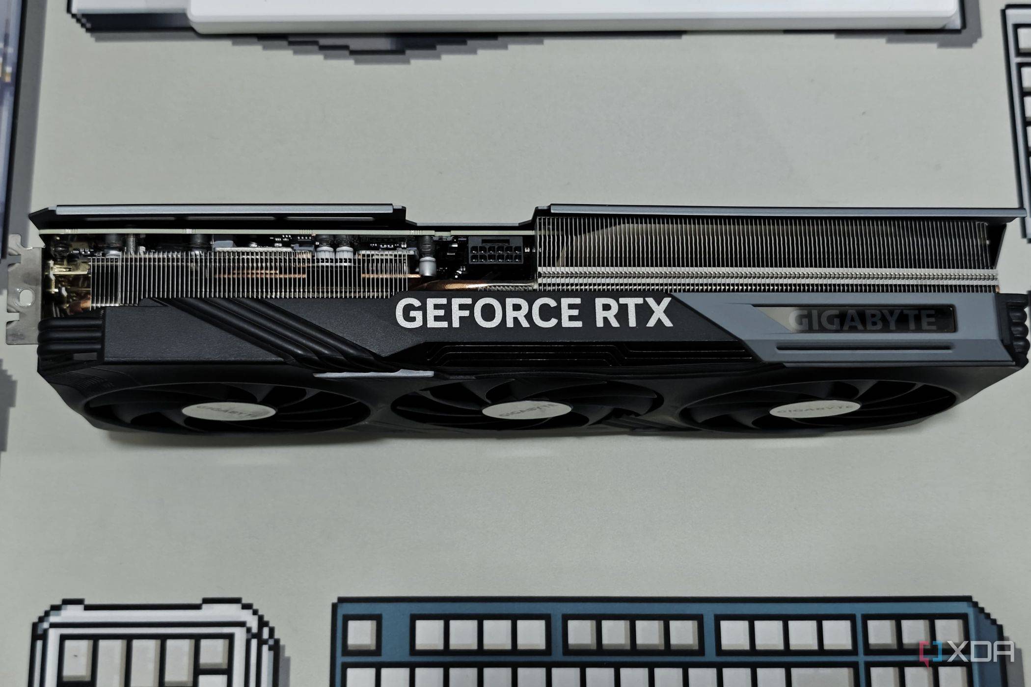 An image showing the side profile of the Gigabyte GeForce RTX 4070 Ti Gaming OC GPU.
