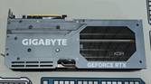An image showing the backplate of a Gigabyte GeForce RTX 4070 Ti Gaming OC GPU that's kept on a deskmat.