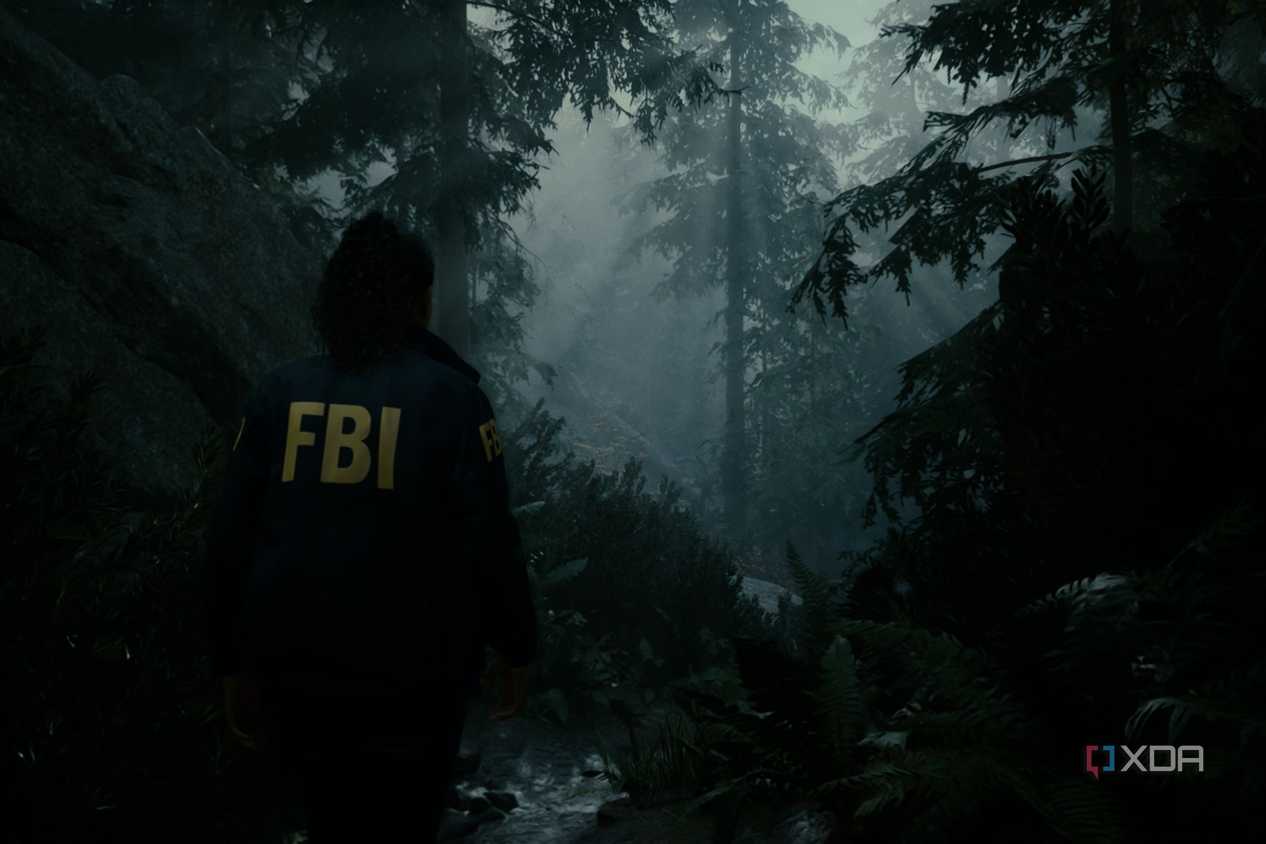 A screenshot showing "god rays" peeking through the trees in Alan Wake 2.