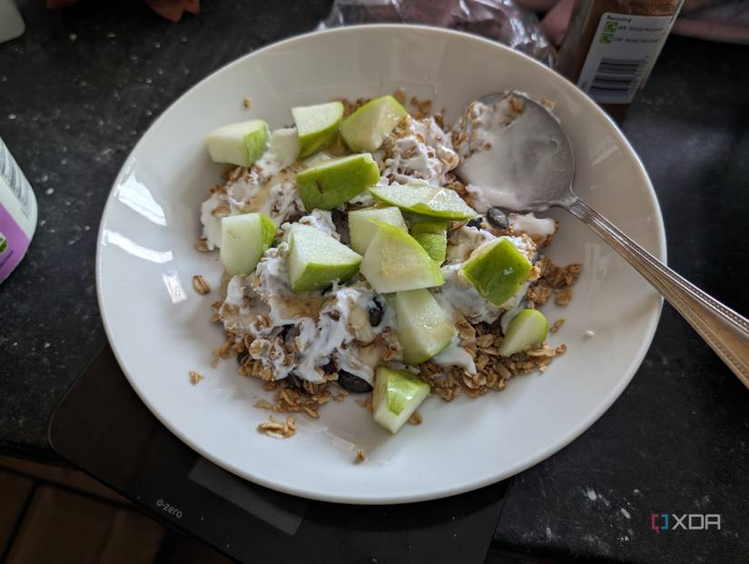 Greek Yogurt with granola, apple, and a honey drizzle