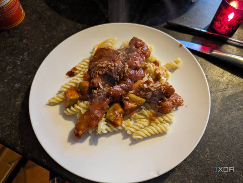 Jerk chicken pasta on a plate