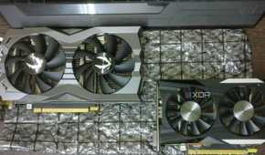 GTX 1660 Ti and GTX 1050 Ti graphics cards on a desk