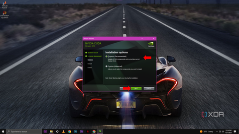 A screenshot of the NVIDIA Installer window presenting "Installation options" with a choice between "Express (Recommended)" and "Custom (Advanced)" and a red arrow pointing to the "Next" button.