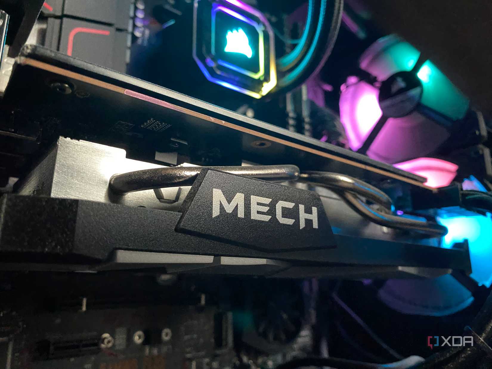 MSI AMD GPU with water cooling and colored fans in background
