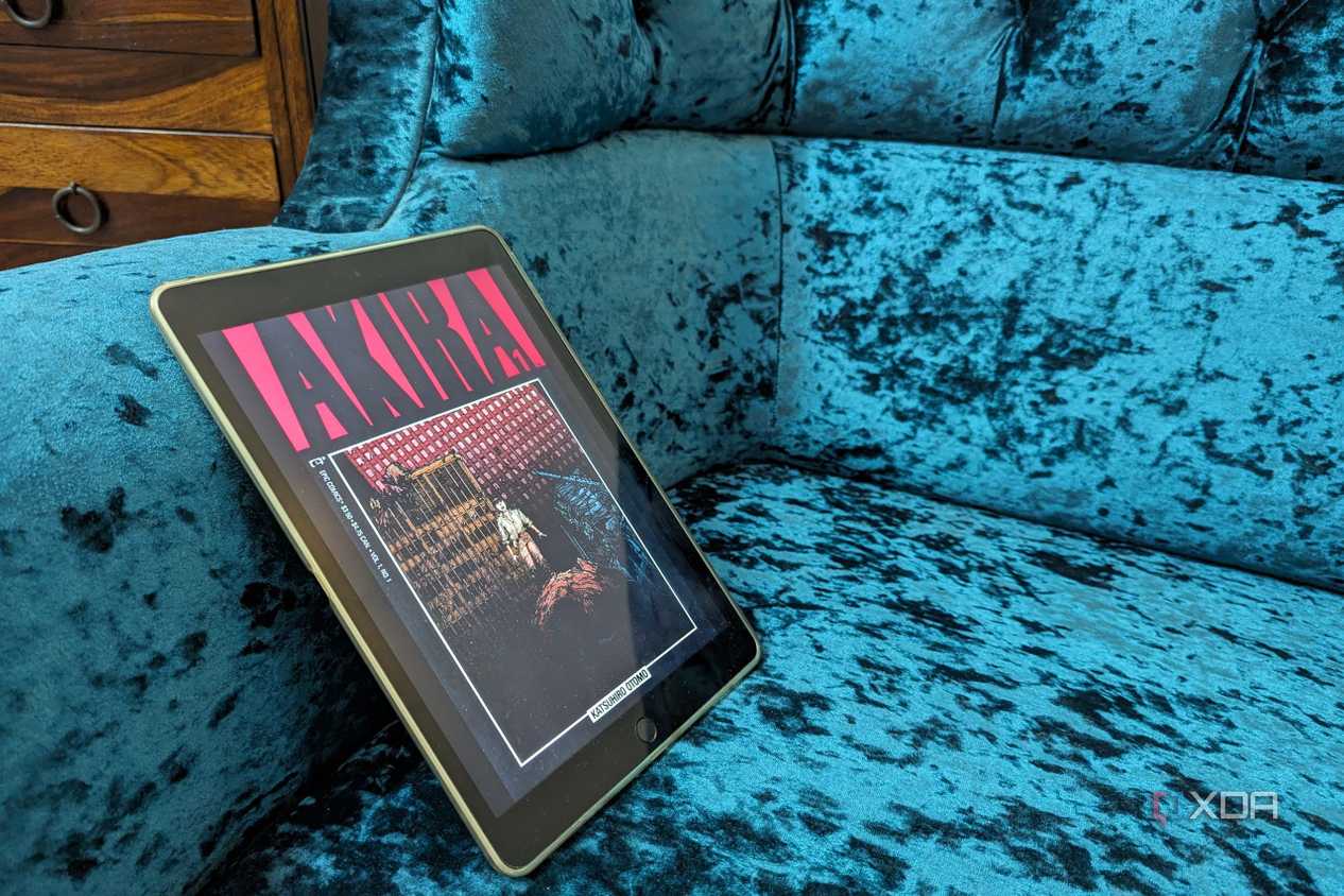 iPad 9th generation on blue sofa