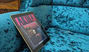 iPad 9th generation on blue sofa