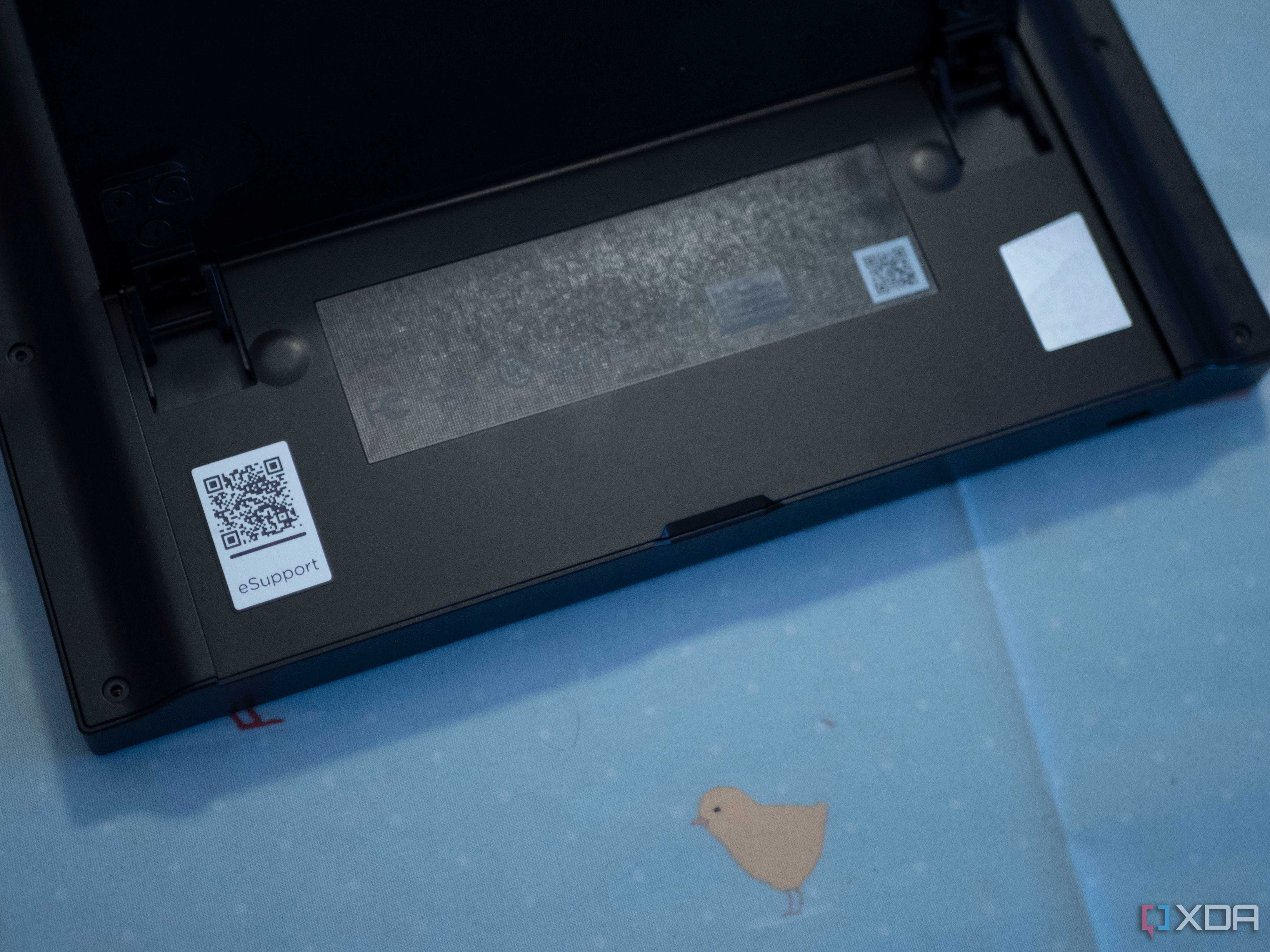 Lenovo Legion Go under the backplate with device facing down on a table