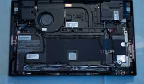 Lenovo Legion Go face down on a table with backplate removed