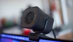 Logitech StreaCam on top of a laptop, sideways to the camera