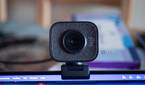 Logitech StreaCam on top of a laptop, facing the camera