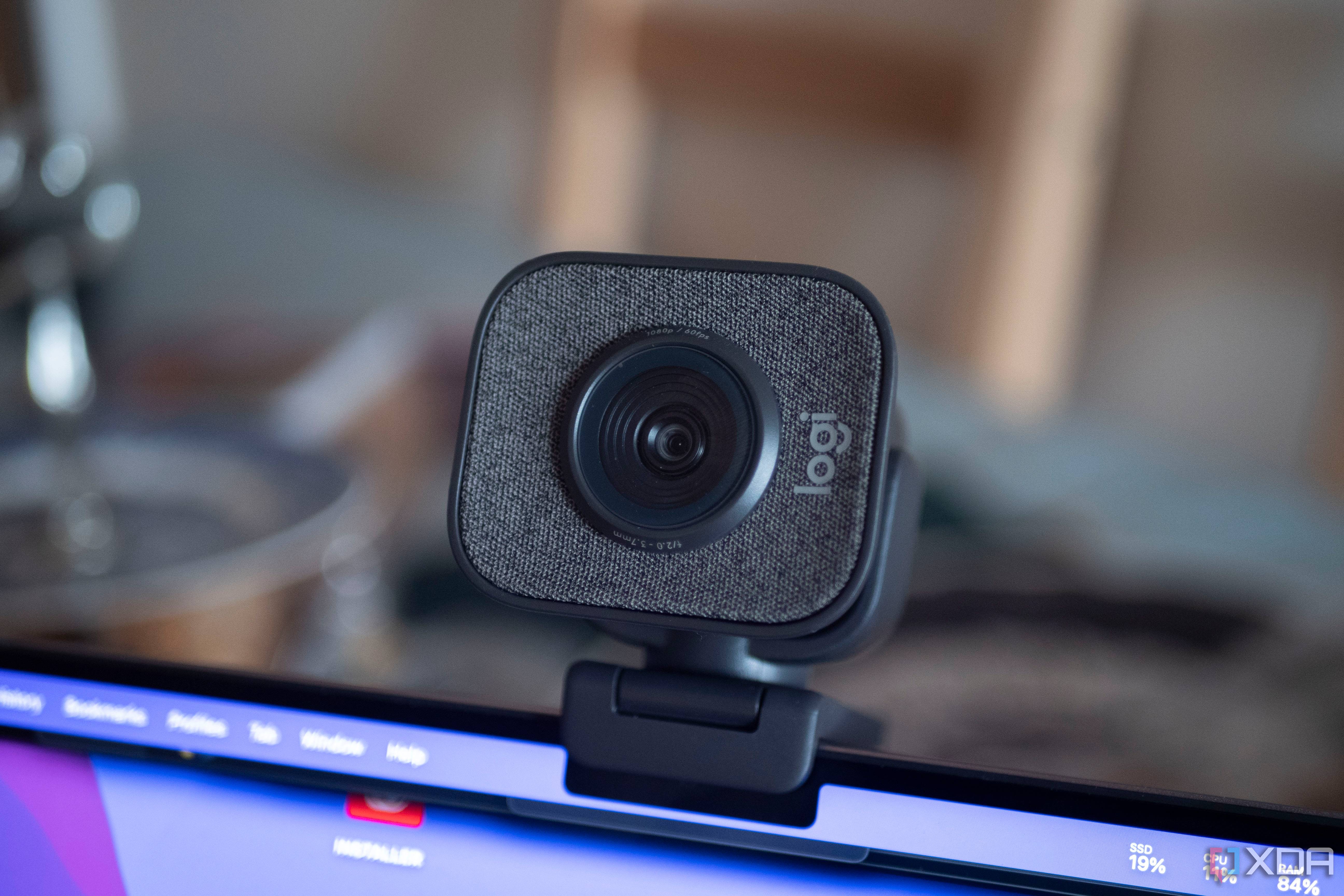 Logitech StreaCam on top of a laptop, facing the camera