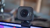 Logitech StreaCam on top of a laptop, facing the camera