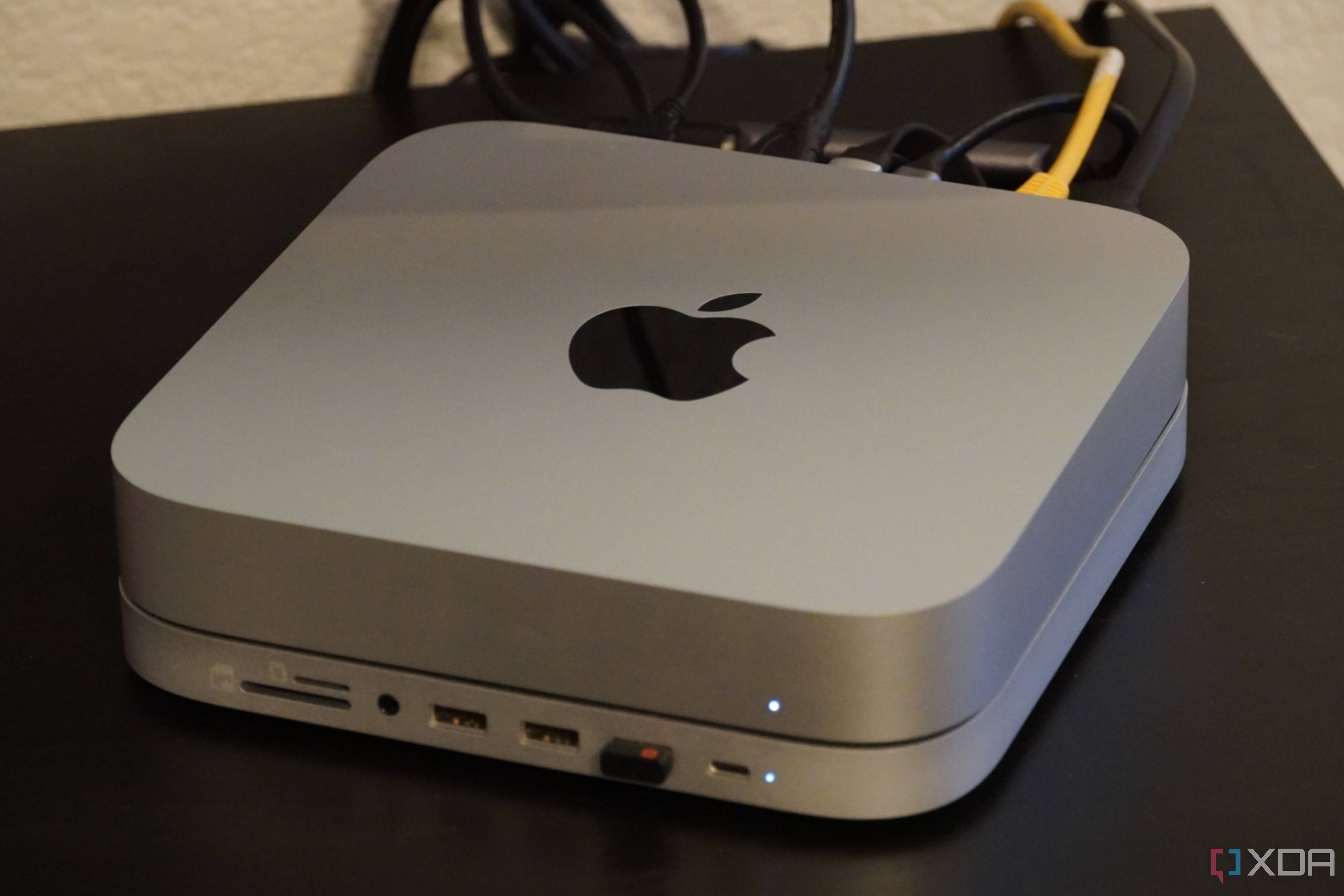A Mac Mini with a Satechi dock connected.