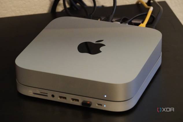 A Mac Mini with a Satechi dock connected.