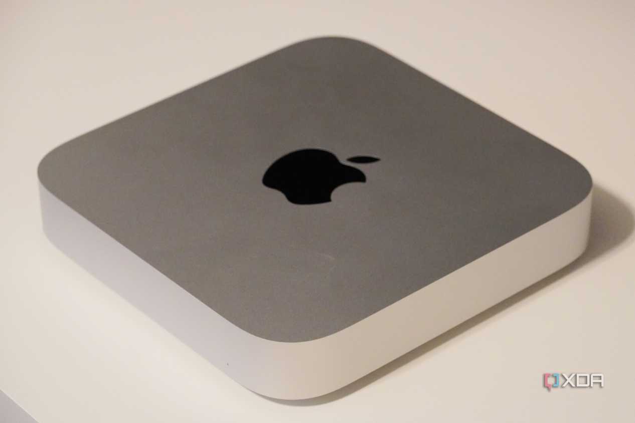 The silver Mac Mini on a desk.