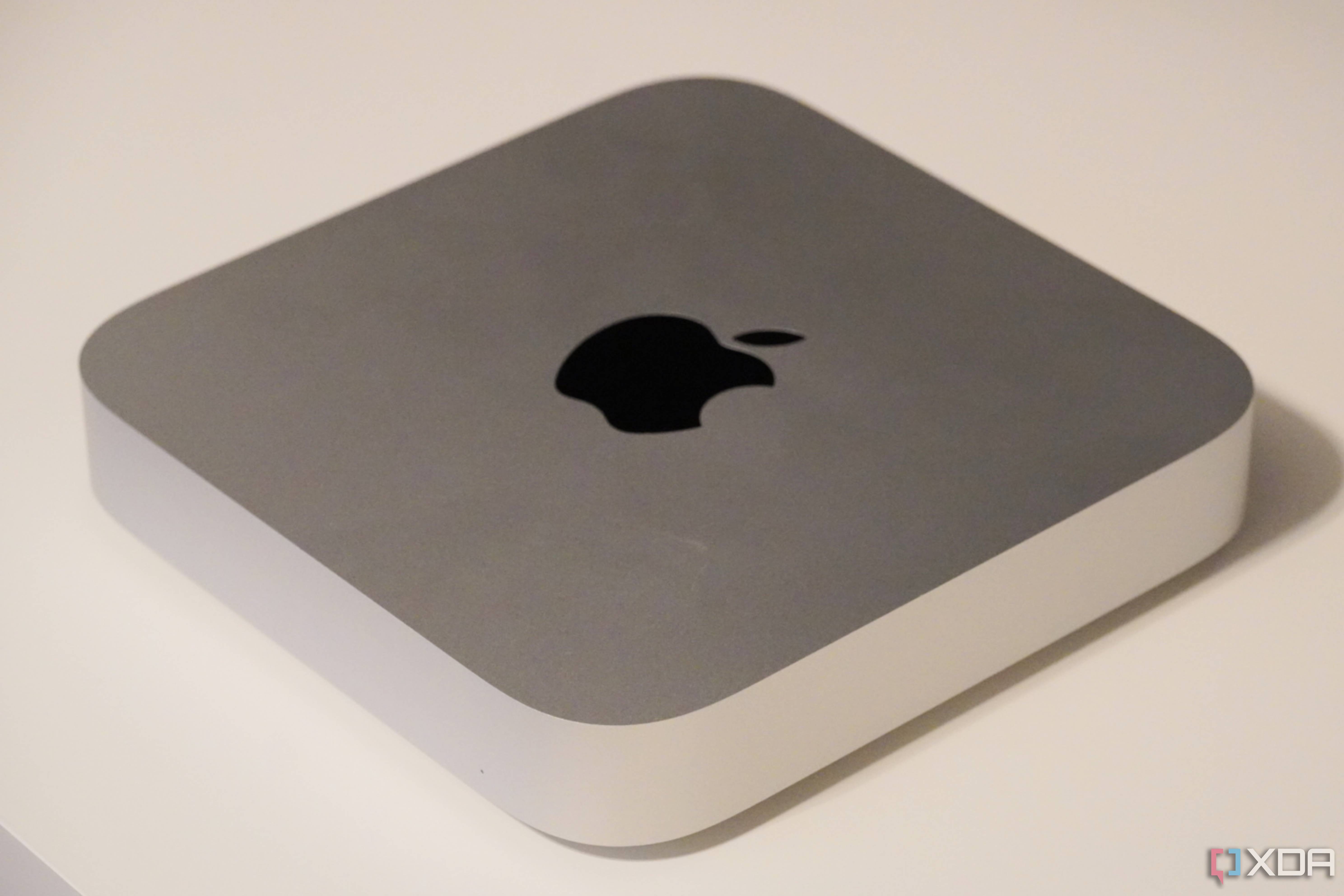The silver Mac Mini on a desk.