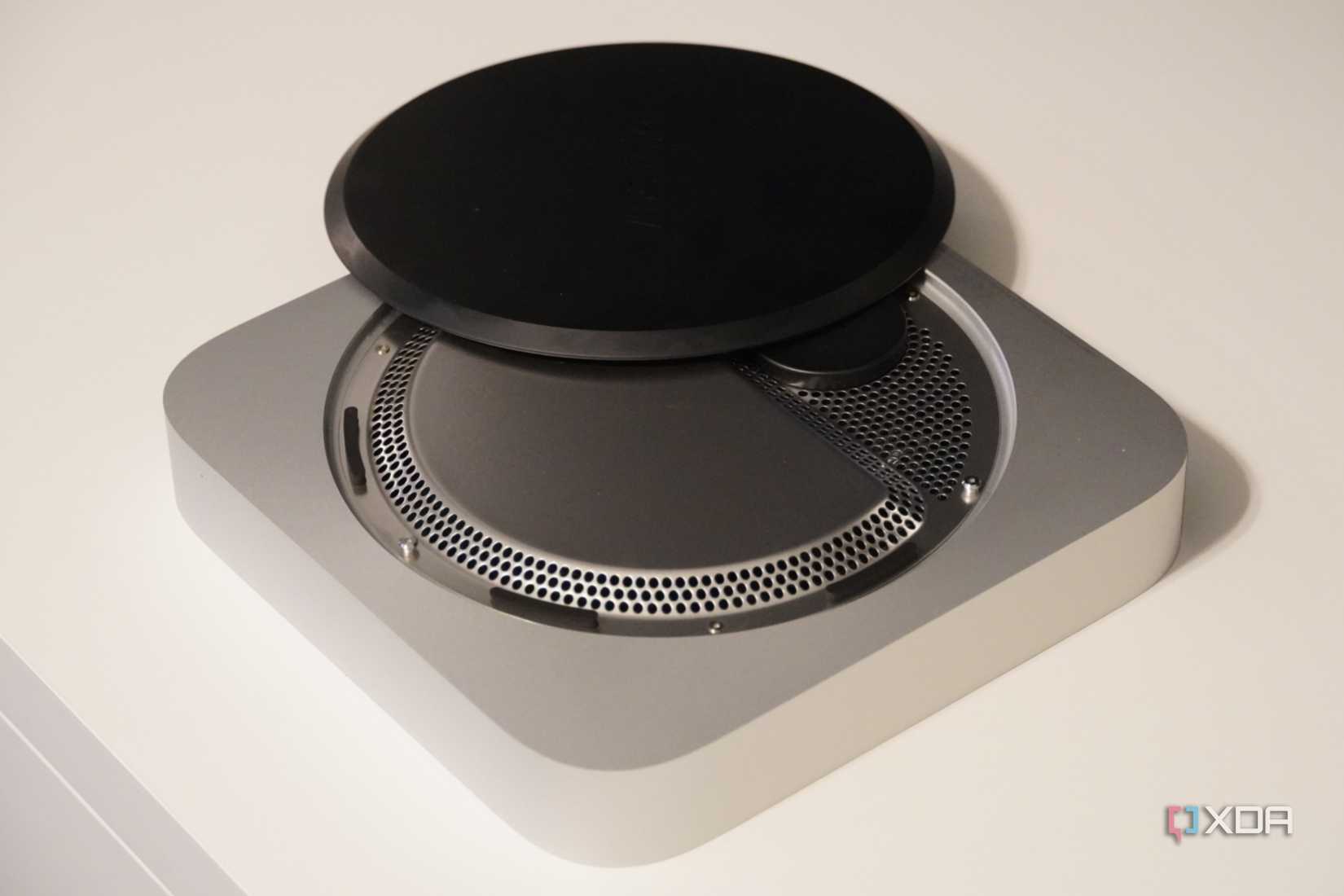 The plastic cover of the Mac Mini.