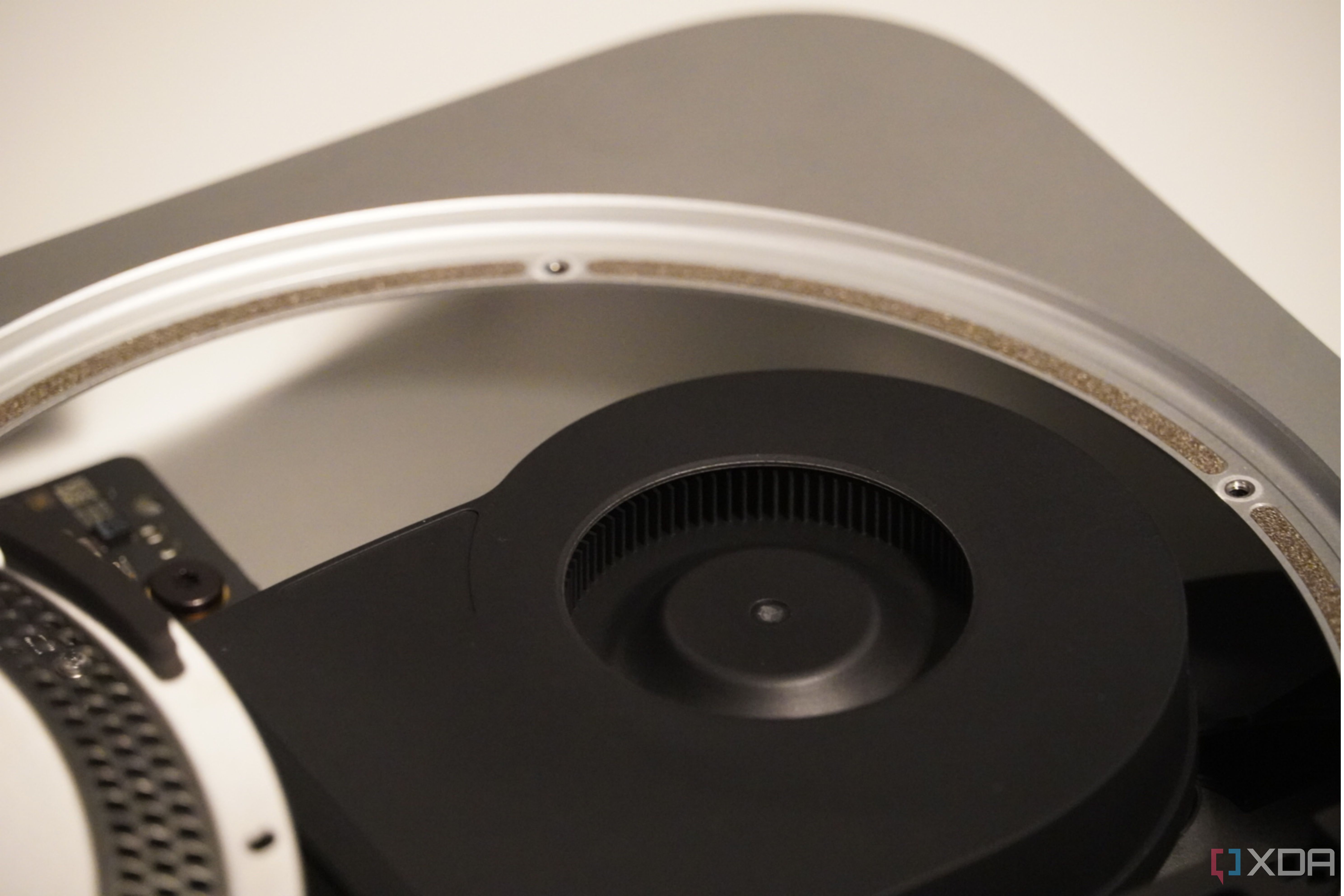 The internals of the Mac Mini, showing empty space.