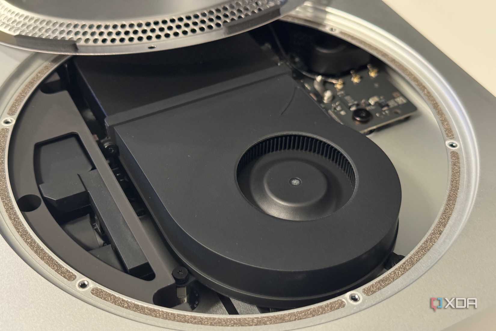 The internals of the Mac Mini, showing empty space.