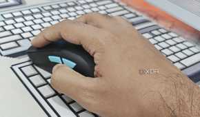 An image showing a perosn using the Harpe Ace Aim Lab Edition gaming mouse.