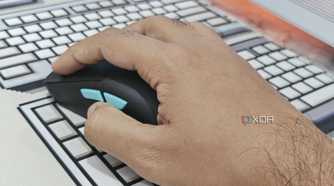 An image showing a perosn using the Harpe Ace Aim Lab Edition gaming mouse.