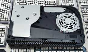 An image showing a PS5 laying flat on a table without the side panel.