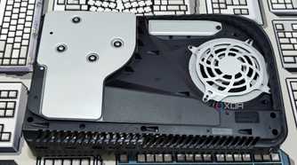 An image showing a PS5 laying flat on a table without the side panel.