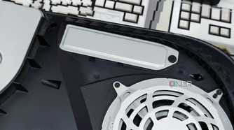 An image showing the PS5 SSD slot with a cover on it.