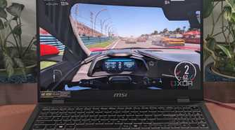 A photo of playing Forza Motorsport on the MSI Prestige 16 AI Evo laptop showing framerates at the top of the screen