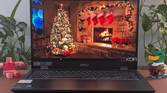 A photo of the display on the MSI Prestige 16 AI Evo showing a chrismtad scene with fireplace