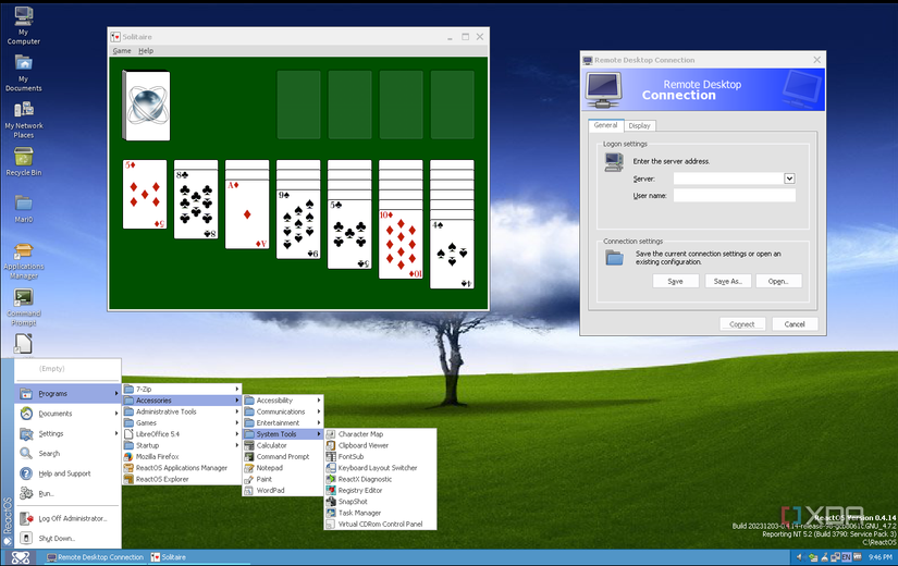 ReactOS desktop with an expanded start menu, with the RDP client and Solitaire running on background