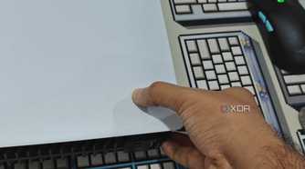 An image showing a person trying to remove PS5 side panel.