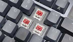 An image showing ASUS NX Red linear switches installed on an ROG Azoth keyboard.