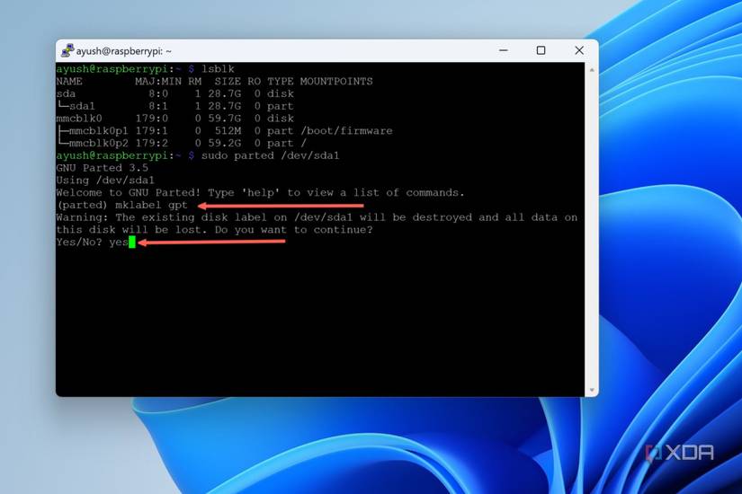 A screenshot of PuTTY with the mklabel gpt command highlighted