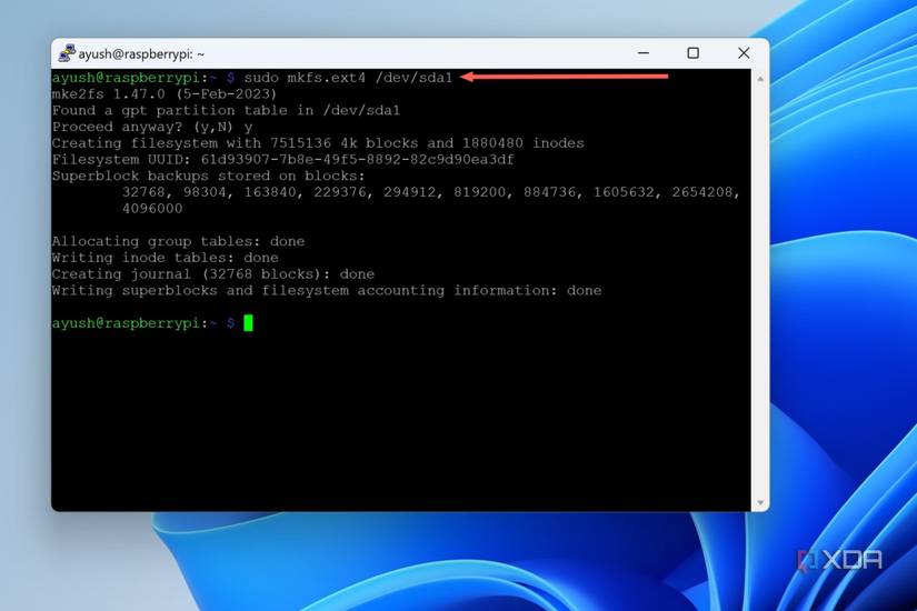 A screenshot of PuTTY with the mkfs.ext4 command highlighted