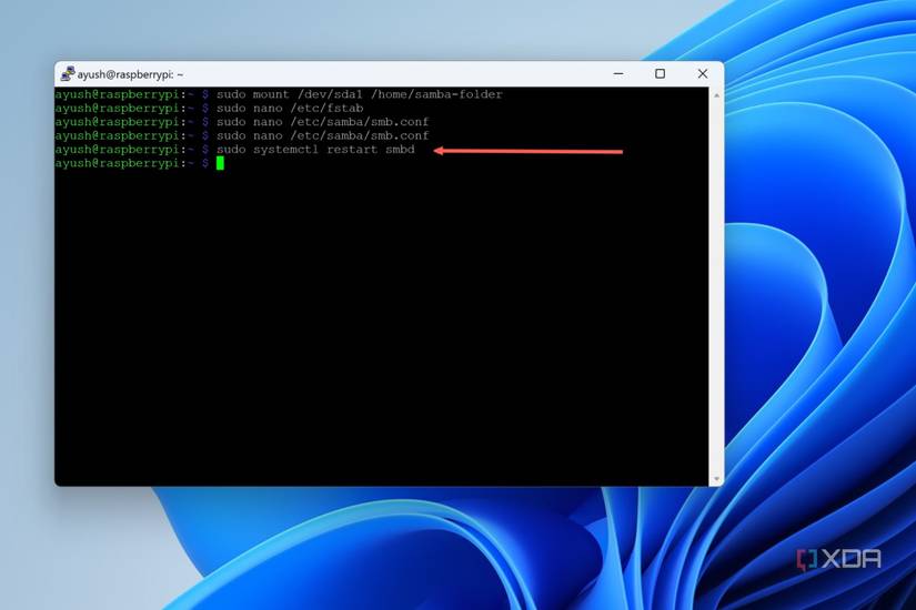 A screenshot of PuTTY highlighting the command to restart Samba