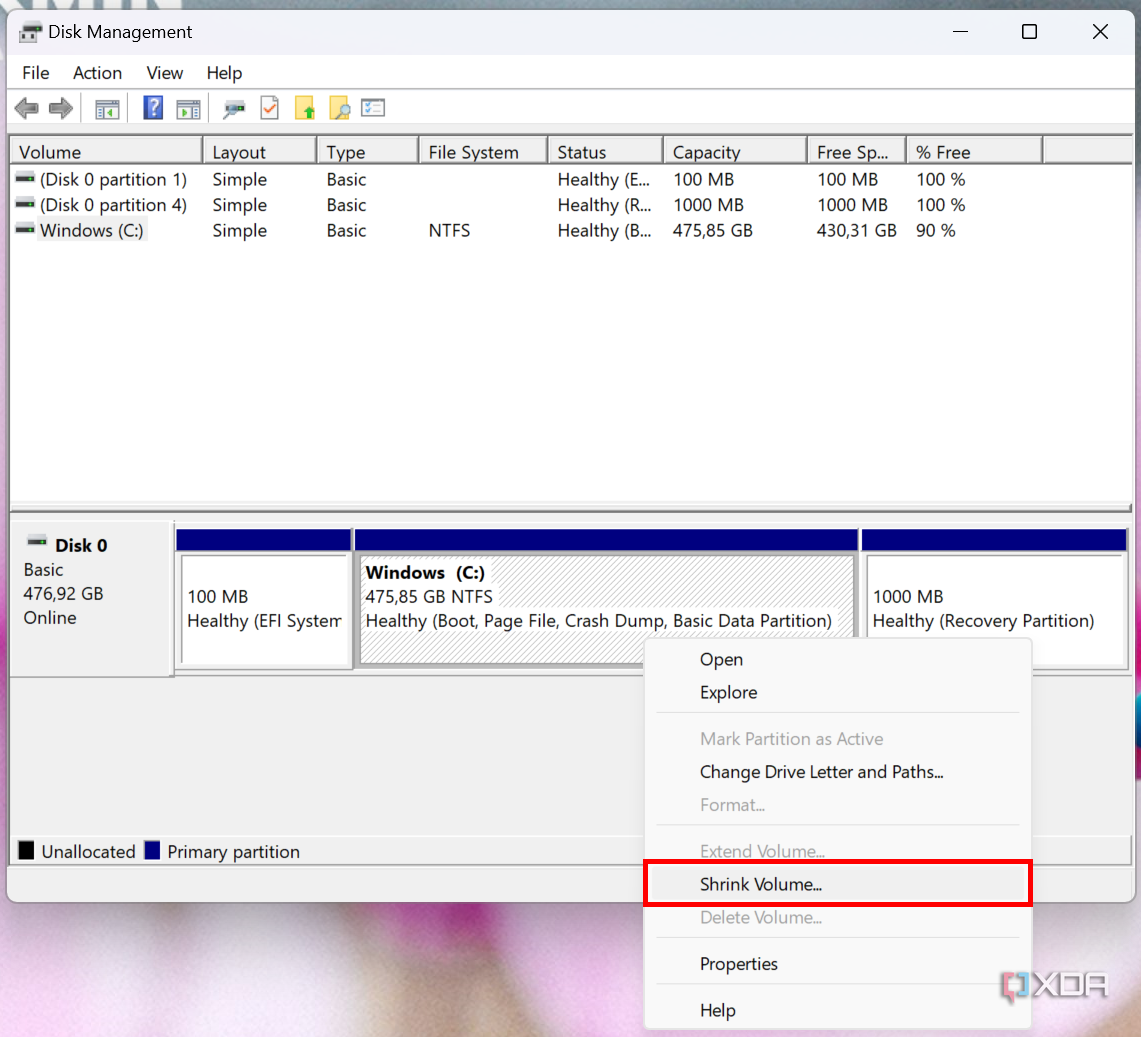 Screenshot of Disk Management in Windows 11 with the option to shrink a volume