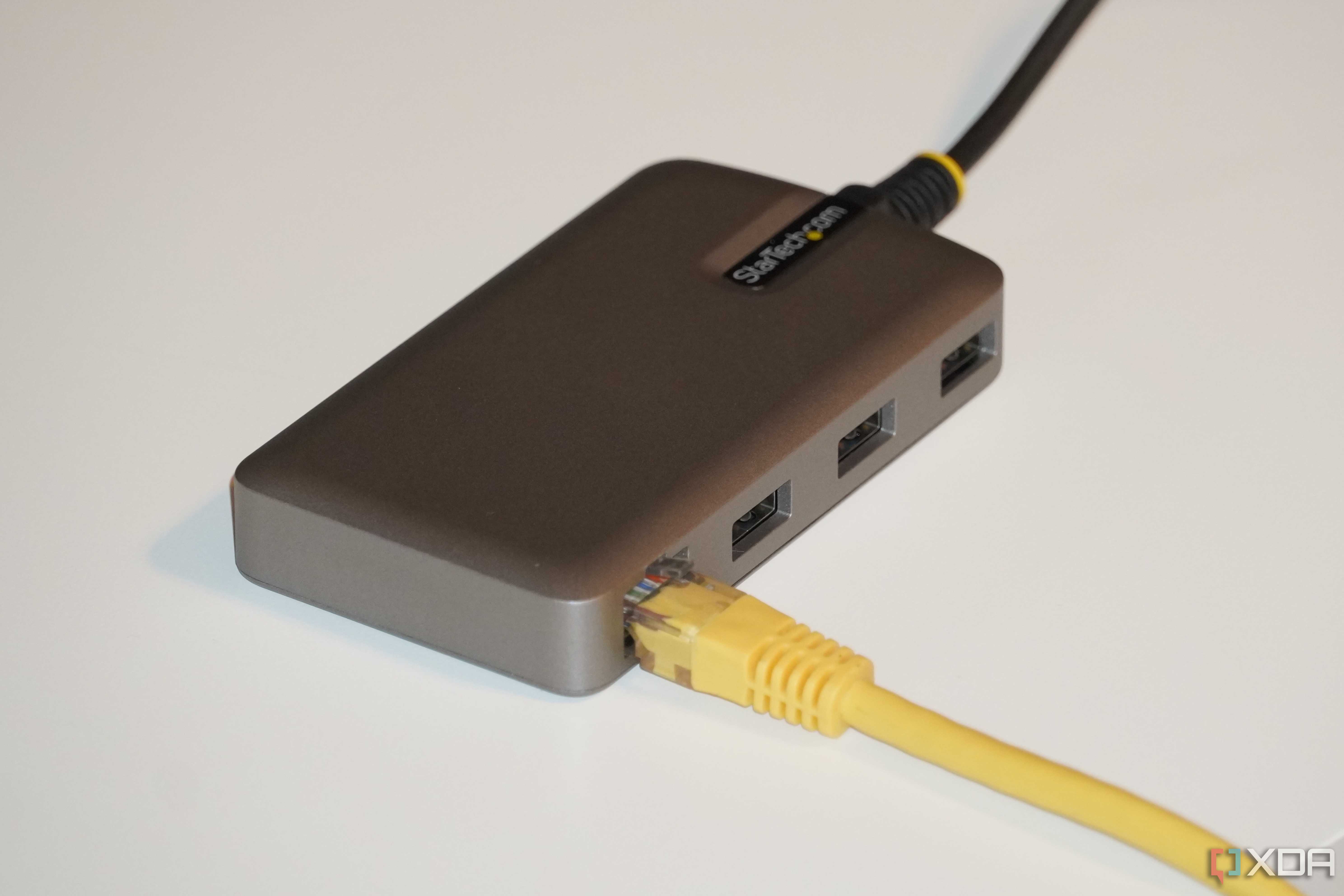 An Ethernet cable connected to a Startech dock.