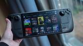 A person holding the Steam Deck OLED.