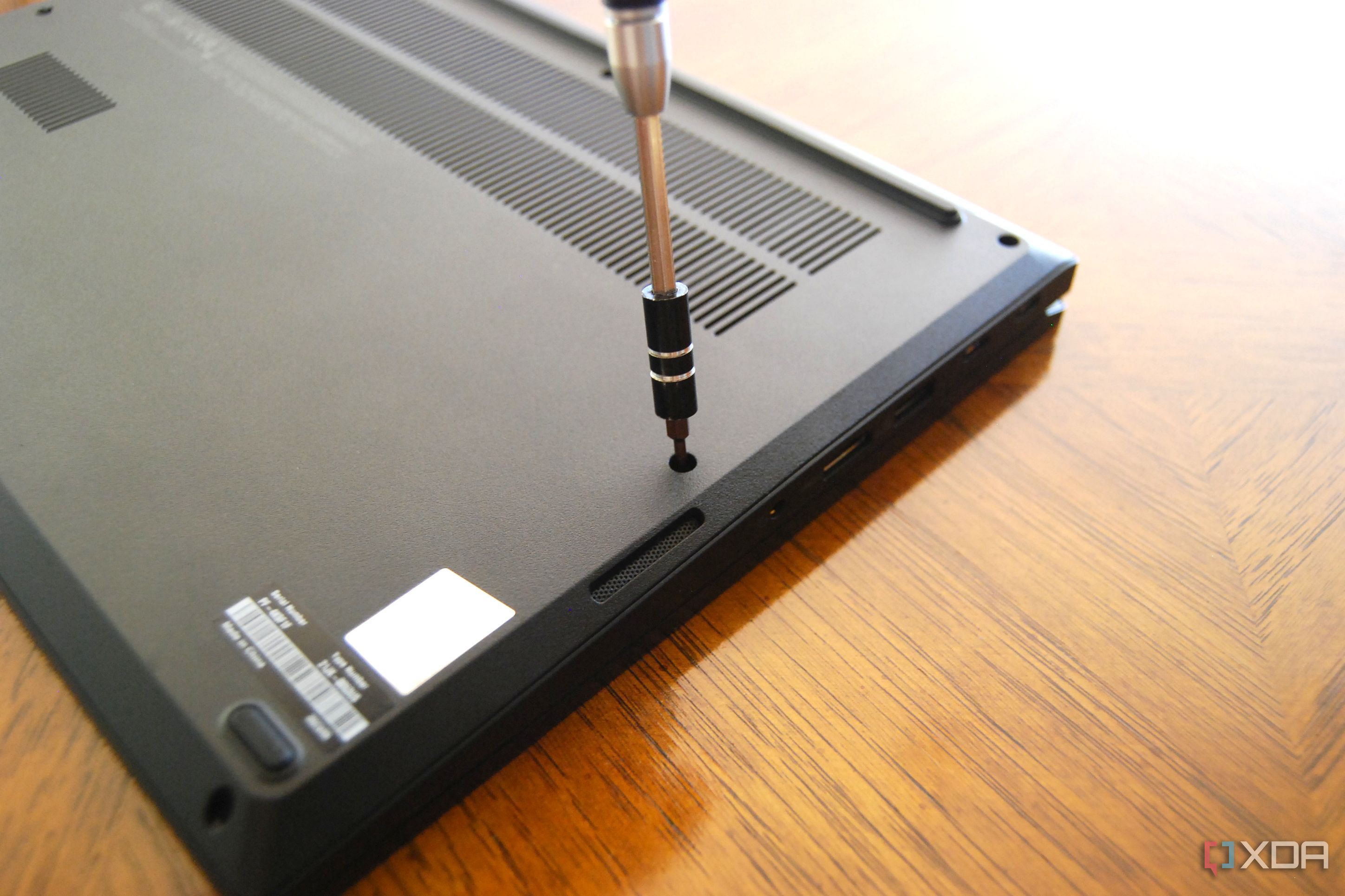 Unscrew the ThinkPad E14's fasteners