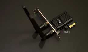 TP-Link Archer TX20E Wi-fi 6 adapter with antennas attached