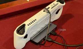 Cables coming out of the back of a UGreen dock for gaming handhelds.
