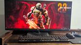 ultrawide monitor setup with doom eternal wallpaper