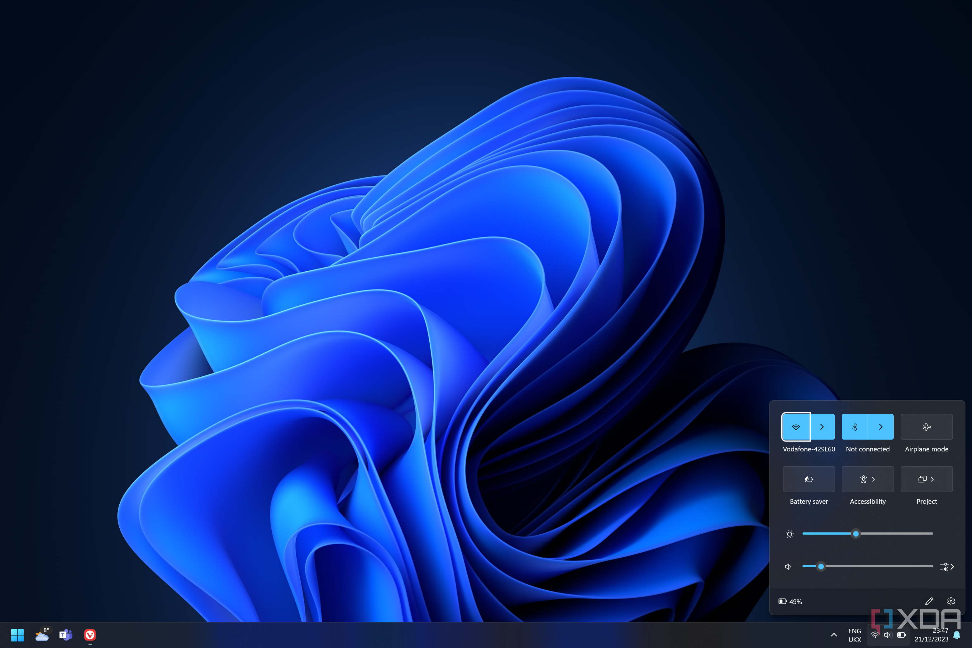 Screenshot of a Windows 11 desktop with the Quick Settings panel open