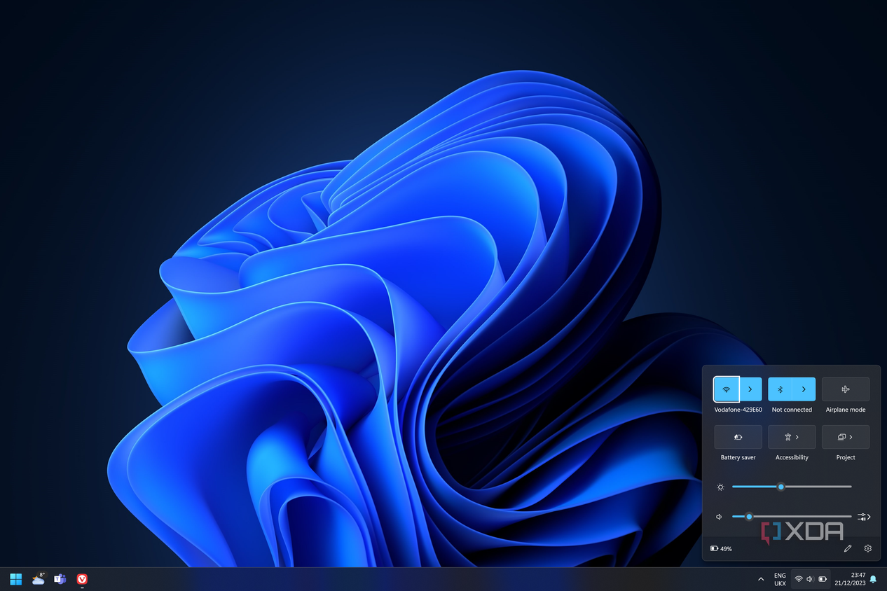 Screenshot of a Windows 11 desktop with the Quick Settings panel open