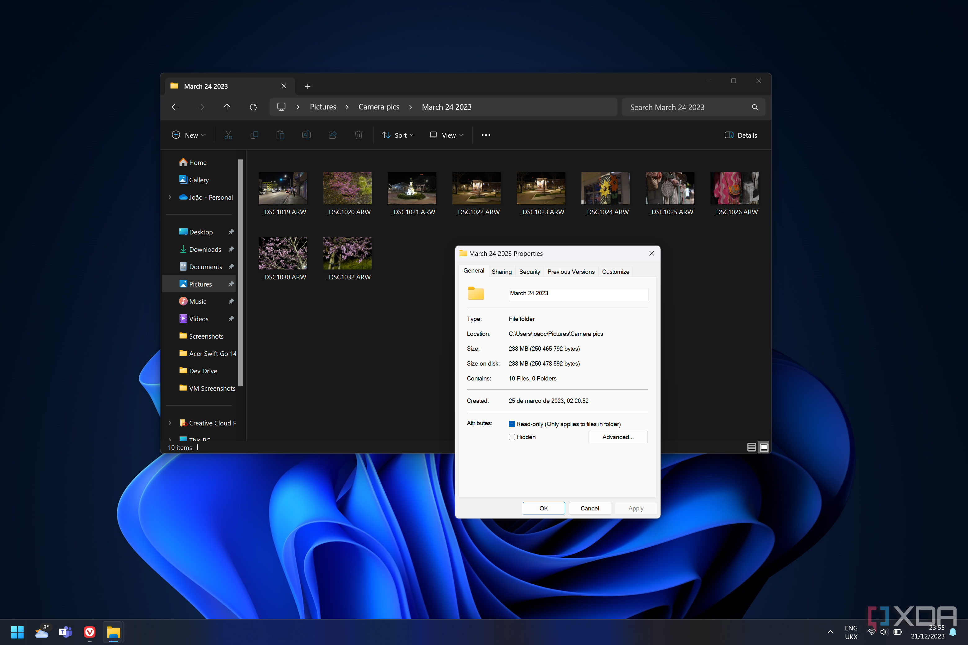 Screenshot of Windows 11's FIle Explorer with a properties dialog open over it