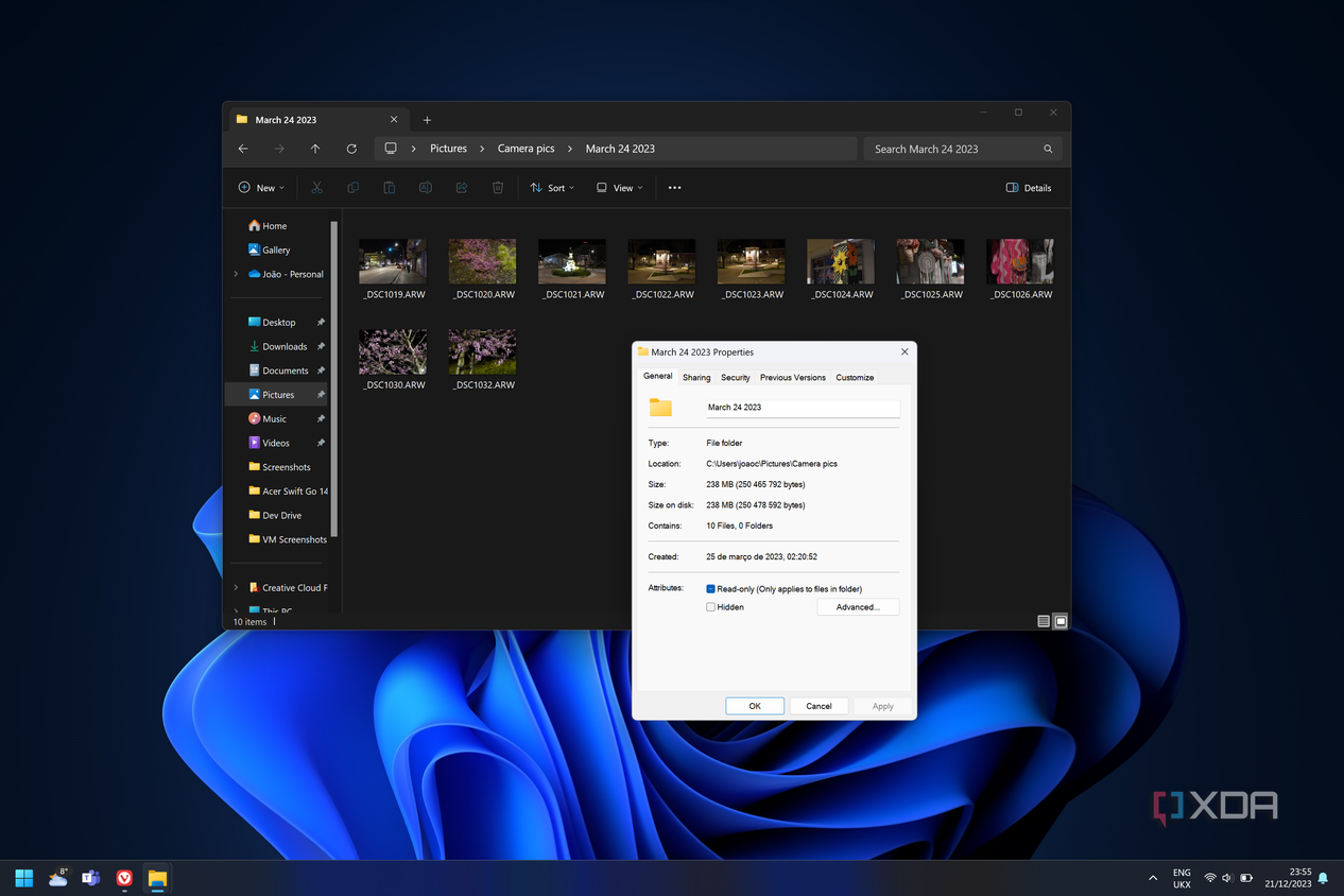 Screenshot of Windows 11's FIle Explorer with a properties dialog open over it